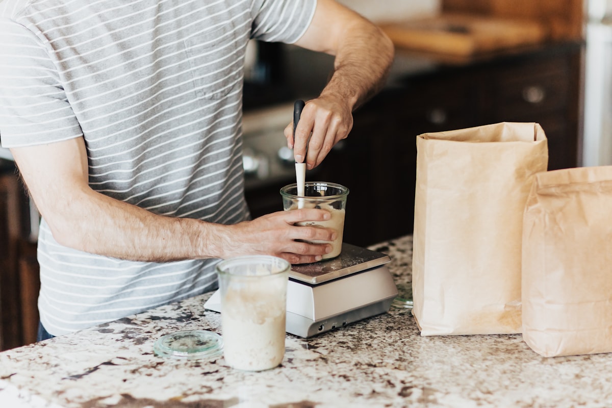 Man preparing healthy meal in kitchen